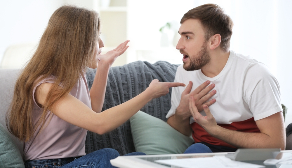Couple arguing about money at home. Problems in relationship